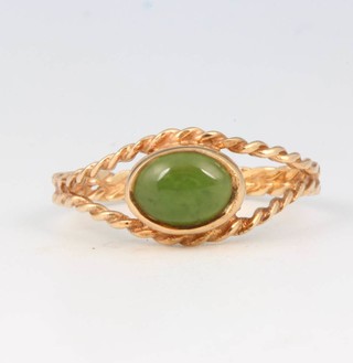 A 9ct yellow gold jade set ring size M 