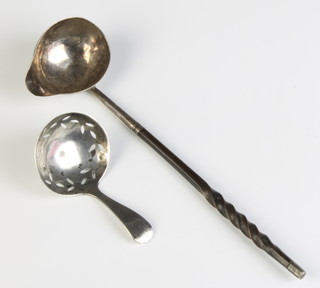A silver William IV caddy spoon with pierced bowl and a toddy ladle 