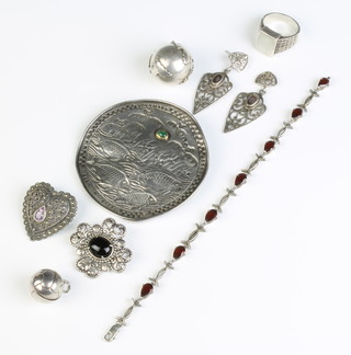 A silver pendant and minor silver jewellery 88 grams
