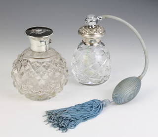 A silver and tortoiseshell mounted toilet bottle London 1921, 10cm and a silver mounted perfume atomiser Birmingham 1986 11cm 
