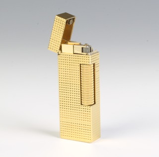 A gentleman's gold plated Dunhill cigarette lighter 