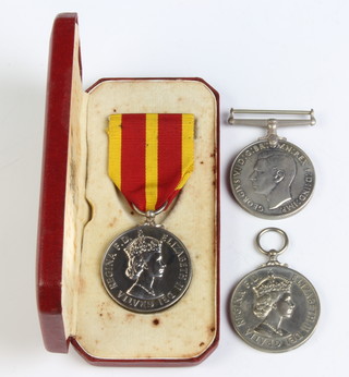 Fire Brigade, a Queens Fire Service Medal to William R W Golding CH.Offr.Darlington Fire Brigade, a Fire Brigade Long Service Medal to Stn.Offr.William.R.Golding and a Defence medal together with a newspaper cutting and posting box 