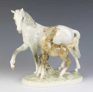 A Hutschenreuther figure group of a stallion and foal, printed marks to base 20cm 