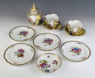 A pair of Dresden yellow ground cabinet cups and saucers with panels of flowers and figures, a ditto baluster vase and cover 15cm, a ditto saucer decorated with flowers and 4 Russian plates with spring flowers 
