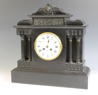 A Victorian 8 day striking mantel clock with enamelled dial and Roman numerals contained in a black marble architectural case 