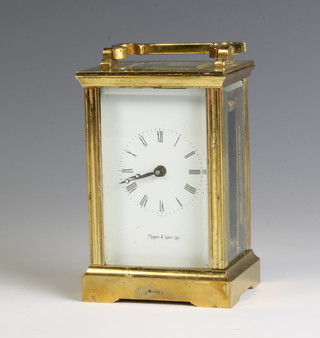 Mappin & Webb, a 20th Century 8 day carriage timepiece with enamelled dial and Roman numerals contained in a gilt metal case 
