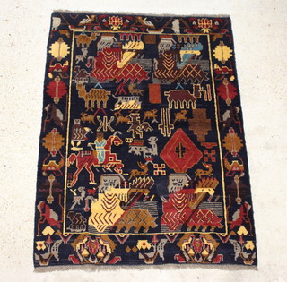 A black ground Baluchi pictorial rug 170cm x 122cm 