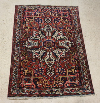 A tan, white and blue ground Bakhtiari rug with central medallion 190cm x 130cm 