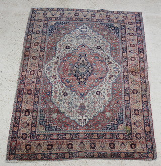 A red and blue ground floral patterned Persian rug with central medallion within multi row borders 178cm  x 125cm 