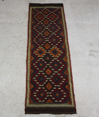 A red tan and brown ground Suzni Kilim runner with 21 diamonds to the centre 238cm x 71cm 