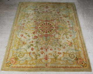 A 1930's Indian yellow ground Aubusson style carpet with central medallion 307cm x 238cm