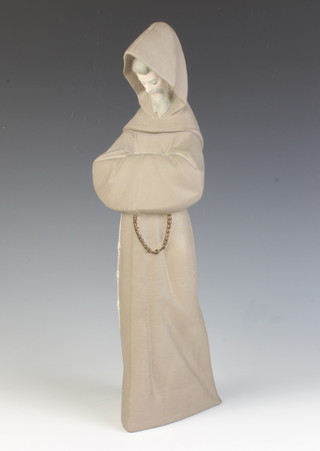 A Lladro matt figure of a standing monk 33cm 