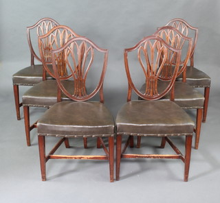 A set of 6 19th Century mahogany Hepplewhite style shield back dining chairs with over stuffed seats raised on square tapering supports with H framed stretchers 