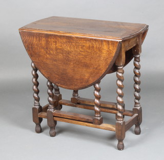 A 1930's oak oval drop flap gateleg tea table raised on spiral turned supports 71cm h x 74cm w x 41cm x 108cm when open