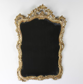 A Rococo style shaped plate wall mirror contained in a decorative gilt frame 91cm h x 66cm 