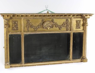 A Regency triple plate over mantel mirror contained in a gilt ball studded frame with frieze decoration and columns to the sides 52cm x 96cm x 8cm 