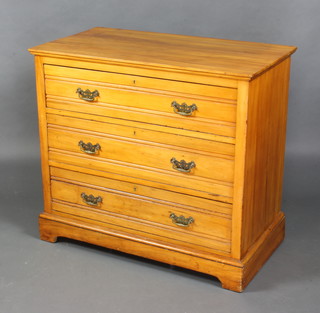 A Victorian satinwood chest of 3 long drawers raised on bracket feet 82cm h x 91cm w x 50cm