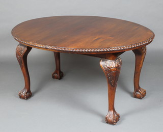 A Chippendale style oval extending dining table with 1 extra leaf, raised on cabriole ball and claw supports 69cm h x 105cm w x 136cm l x 181cm when extended