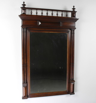 A 19th Century rectangular French over mantel mirror contained in a mahogany frame with column and bobbin turned decoration 130cm h x 82cm w x 9cm d