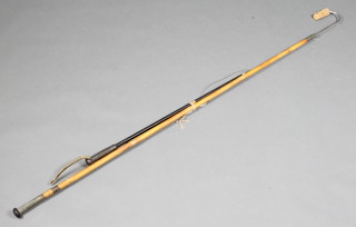 A fishing gaff, wading staff and a salmon tail lifter marked Made in England 