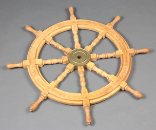 A hardwood and brass mounted 8 spoked ships wheel 86cm diam. 