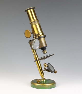 A student's 19th Century brass single pillar microscope 
 