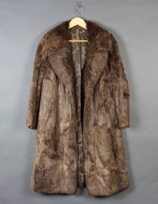 A lady's "silver fox" full length fur coat by Mason Hafur  