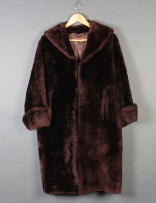 A lady's brown beaver lamp full length coat 
