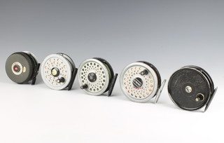 A J W Young 3 1/2" fly fishing reel loaded with Hardy line, a Mitchell 710 auto fly reel, an alcocks popular fly reel, a 3 1/2" fly reel and an intrepid rim fly reel  