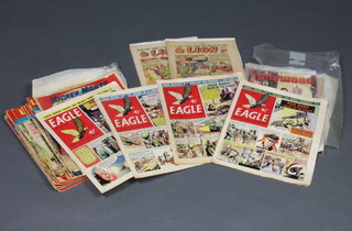 A collection of British and other comics to include Eagle x 4, Lion x 2, Tiger, Beano x 2, Sparky, Look and Learn x 13, a Mickey Mouse comic (1949) and 2 Disney song books
