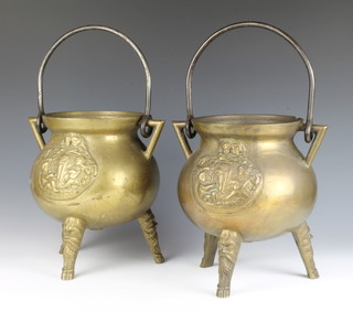 A pair of Continental cast gilt metal cauldrons with iron swing handles decorated classical figures 31cm x 30cm diam. 