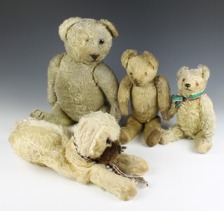 A yellow teddy bear with articulated limbs 30cm, 2 other bears 40cm (worn and no eyes) and 52cm (eye missing and worn) together with a pyjama case in the form of a seated dog 
