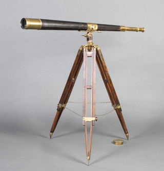 W Ottway & Company Ltd Ealing London, a Victorian 2 draw brass and leather telescope, raised on a Blunt and Way no.125 military issue brass and mahogany, adjustable tripod 