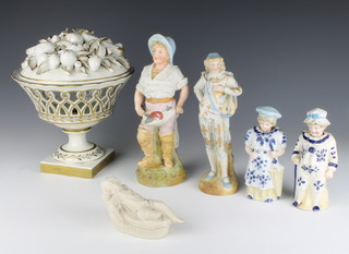 A Continental bisque figure of a fisherman 28cm, a ditto of a man 25cm, a pair of German nodding head figures 17cm, a Copeland box and cover and an Italian bowl and lid decorated with fruits 