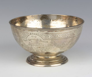 A Victorian silver bowl with engraved floral swags Sheffield 1855, 12cm, 136 grams