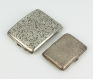 Two silver cigarette cases with chased decoration Birmingham 1914 and 1931, 184 grams 