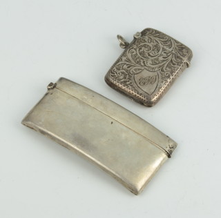 An Edwardian silver vesta Birmingham 1906 and a silver card case Birmingham 1920 59 grams 