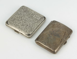 Two silver cigarette cases with scroll decoration Birmingham 1919 and Birmingham 1931, 159 grams  