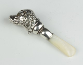 An Edwardian silver and mother of pearl baby rattle/teether in the form of a spaniels head 13cm 