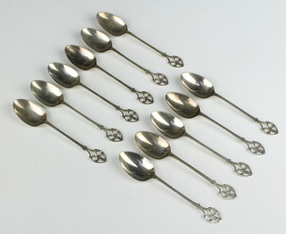A set of 11 Art Nouveau silver teaspoons with pierced handles Birmingham 1932, 110 grams