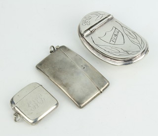 An Edwardian silver vesta Birmingham 1904, a card case and a tobacco box, 162 grams 