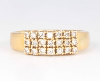 An 18ct yellow gold 21 stone diamond ring, size M, 5.4 grams 