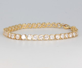 A 9ct yellow gold flat link necklace 2.2 grams and a silver gilt paste bracelet 