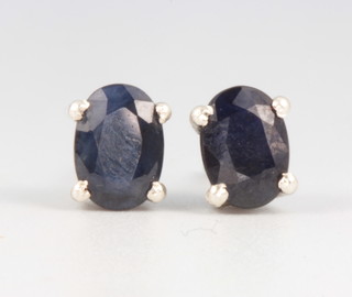 A pair of sapphire and silver ear studs 1.2ct 