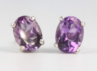 A pair of amethyst and silver ear studs approx. 1.2ct 