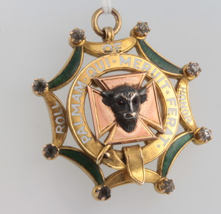 A 9ct yellow gold enamelled and silver Buffalo jewel, gross 22 grams