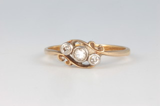 An 18ct yellow gold 3 stone diamond ring 2.3 grams, size P 1/2