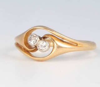 An 18ct yellow gold 2 stone diamond ring 3.1 grams, size P 1/2