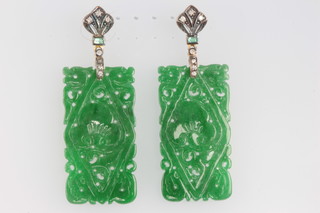 A pair of carved jade emerald and diamond ear drops in the Art Deco style 