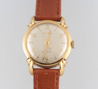 A gentleman's Art Deco Bulova gilt cased wristwatch on a leather bracelet with automatic movement and 30mm case 
